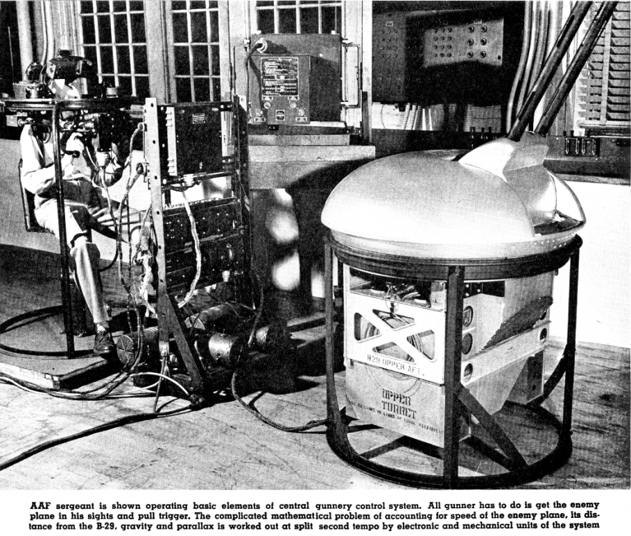 Man sitting at central gunnery control system