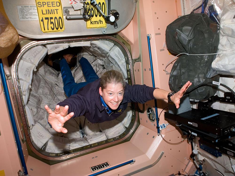 Astronaut Pam Melroy floats in zero gravity in the International Space Station