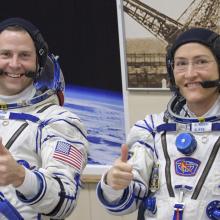 two astronauts in Sokol spacesuits